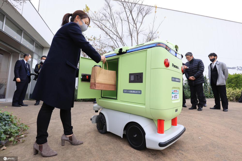 日本快递员是否面临失业？松下在东京测试快递机器人